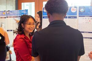 SEED scholars presenting their research at the 2024 Research Symposium